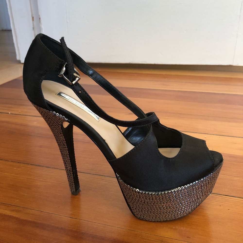 Black heels with silver sequin bottom
